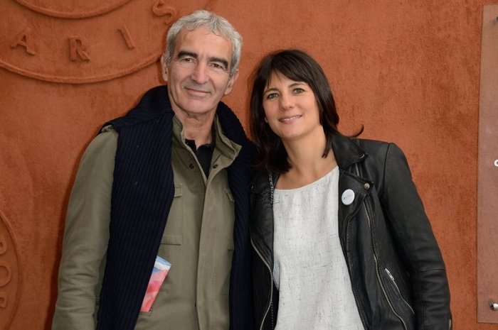 Raymond Domenech et Estelle Denis à Roland Garros en 2014