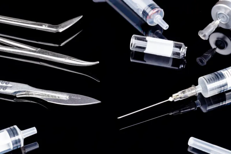 surgical instruments work tool set isolated on a black background surgery concept surgical instruments work tool set isolated on a black background surgery concept