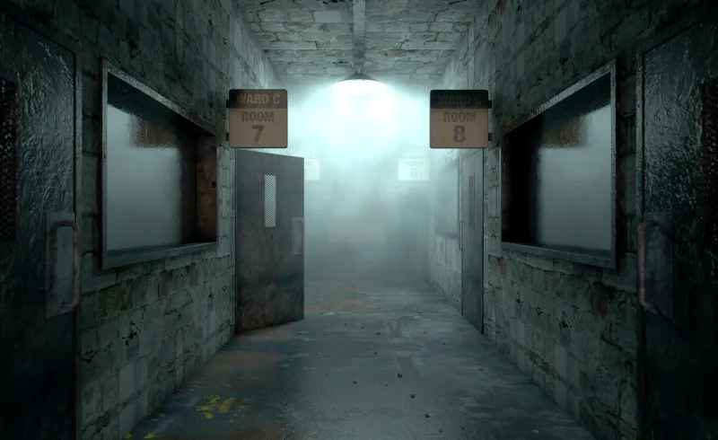 an eerie haunted look down the dimly lit passage of a dilapidated mental asylum with rooms and signs an eerie haunted look down the dimly lit passage of a dilapidated mental asylum with rooms and signs